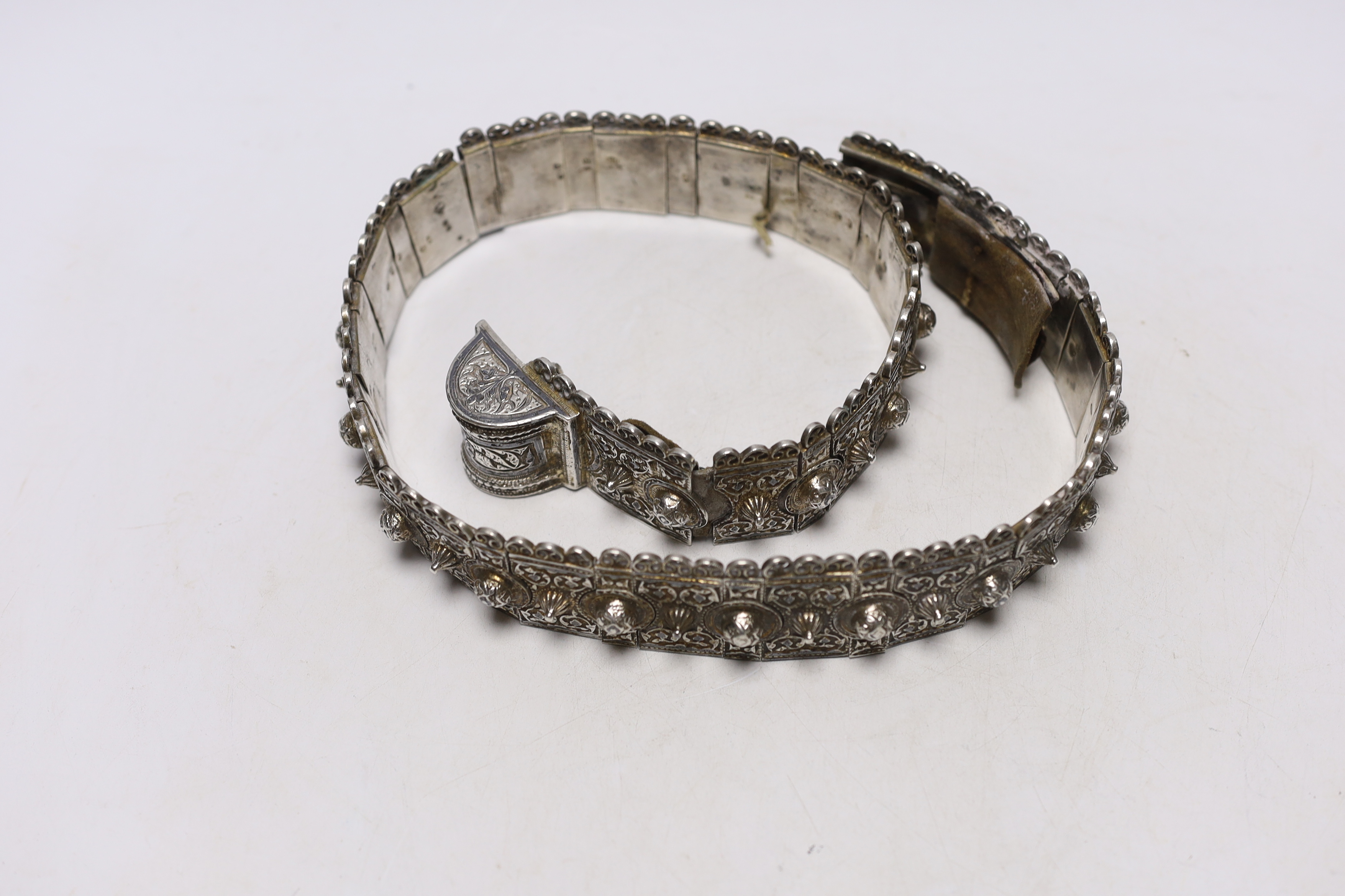 An early 20th century Russian 84 zolotnik belt, with raised conical and domed stud decoration, 79.5cm